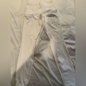 Never worn White Athleta Limited Edition with zip pockets on side size S